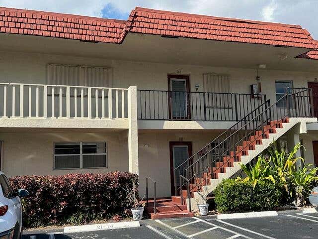 Photo of 21 Abbey Lane #107, Delray Beach, FL 33446 (MLS # B26036245)