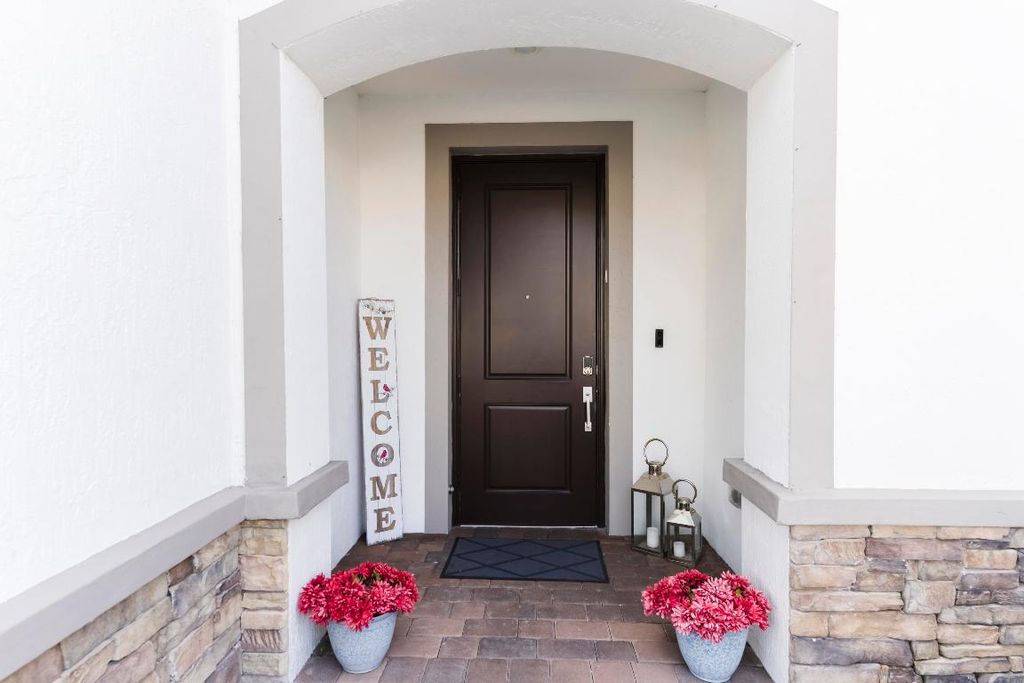 Photo of 2025 Sugar Maples Dr, Riviera Beach, FL 33410 (MLS # R11151491)