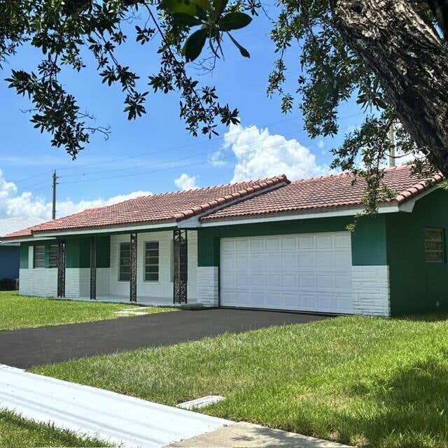 Photo of 3633 NE 6TH Drive, Boca Raton, FL 33431 (MLS # B26063834)