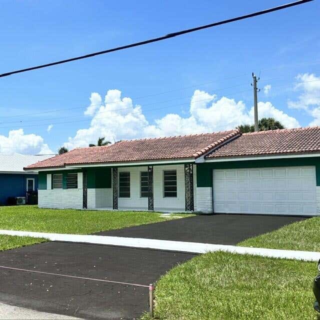 Photo of 3633 NE 6TH Drive, Boca Raton, FL 33431 (MLS # B26063834)