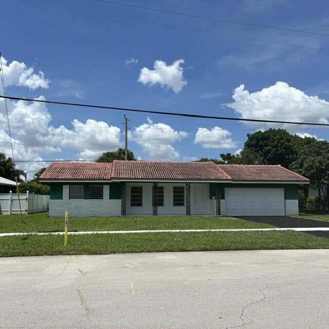 Photo of 3633 NE 6TH Drive, Boca Raton, FL 33431 (MLS # B26063834)