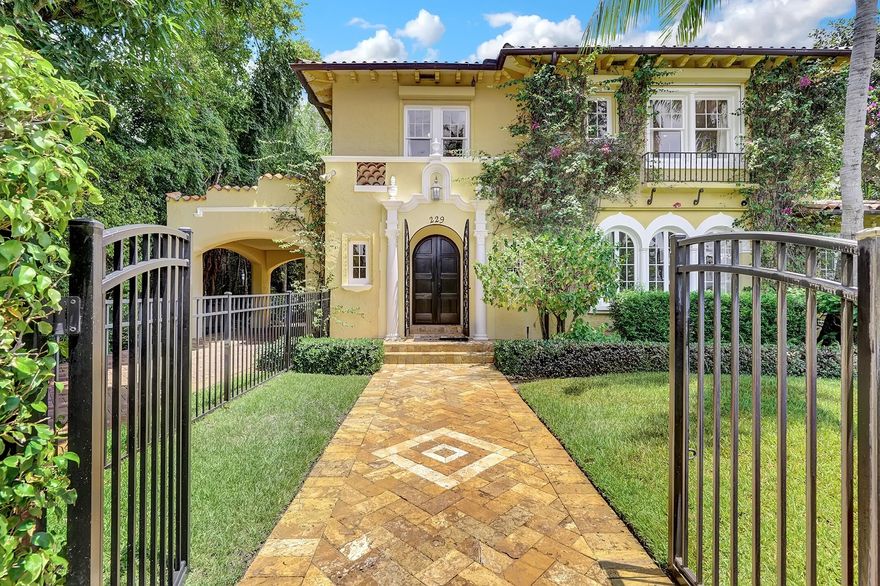 This stunning Mediterranean-style estate is located walking distance to the intracoastal waterway and the heart of downtown West Palm Beach. Spread across a 1/3 acre lot, the property includes a terracotta brick single-family home and a CBS apartment building, offering a total of 5 bedrooms, 4 full bathrooms, and 2 powder rooms. As you step inside, a hand-painted mural comes to life, complemented by faux-marble columns in the main living room. The home is further enhanced by a gas fireplace, restored Dade pine hardwood floors, and Spanish tile. The bathrooms feature travertine finishes, and the gourmet kitchen is outfitted with Viking appliances, granite countertops, and a charming Palm Beach-style breakfast nook.