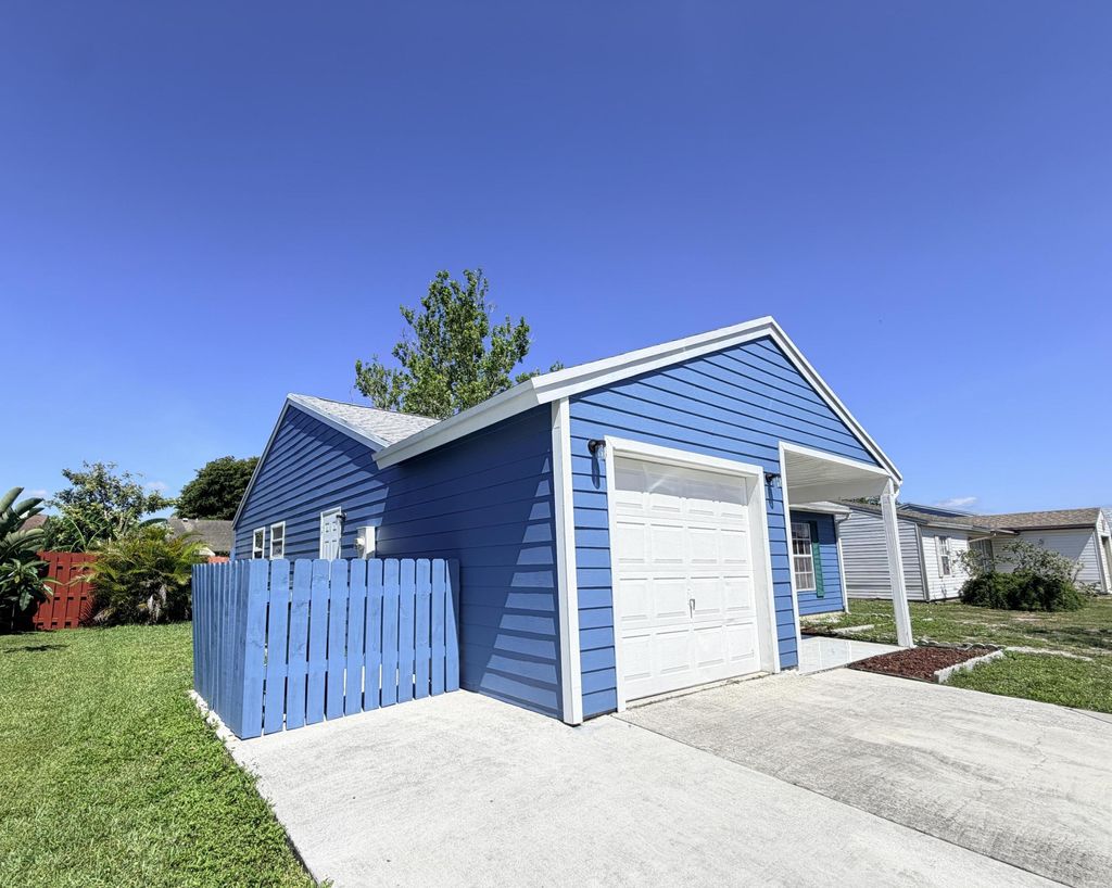 Photo of 5271 Harwood Lane, Greenacres, FL 33467 (MLS # B26031267)