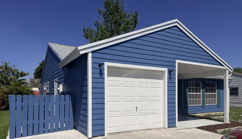 Photo of 5271 Harwood Lane, Greenacres, FL 33467 (MLS # B26031267)