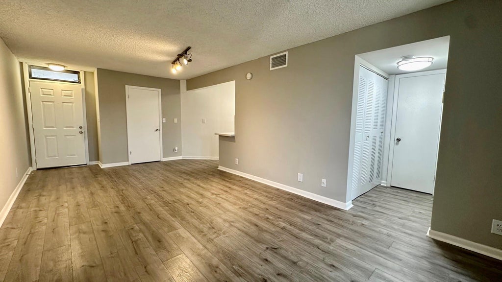 Photo of 215 Lake Pointe Drive #101, Oakland Park, FL 33309 (MLS # B26049533)