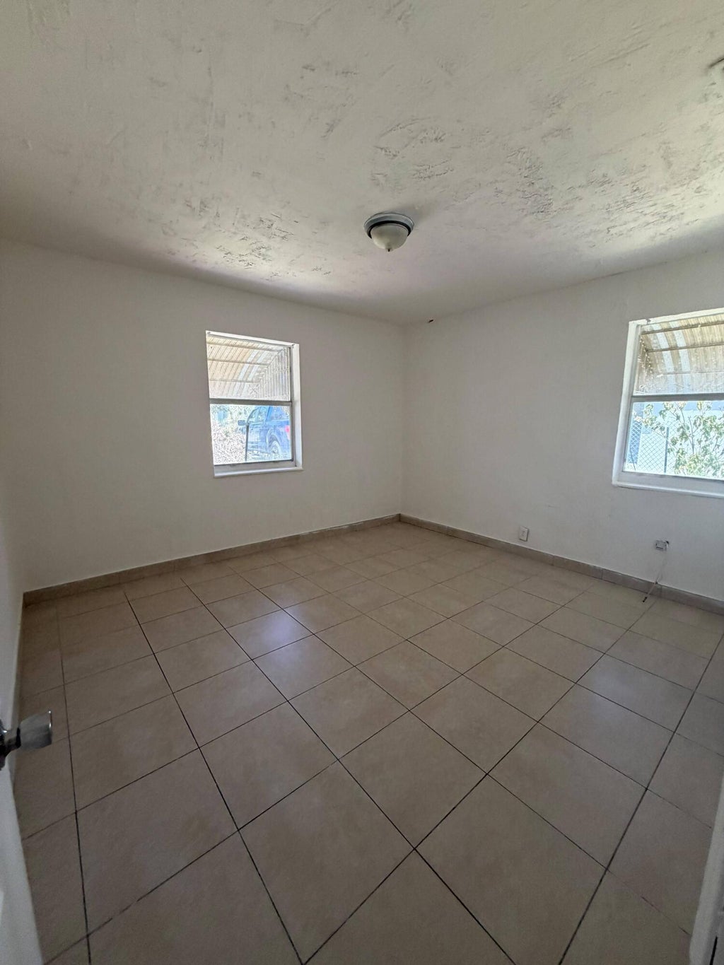 Photo of 1525 W 15TH Street, Riviera Beach, FL 33404 (MLS # B26066499)
