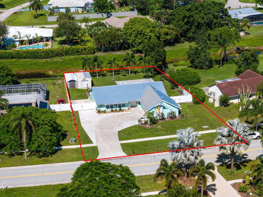 Photo of 2633 SE Gowin Drive, Port Saint Lucie, FL 34952 (MLS # R11110909)