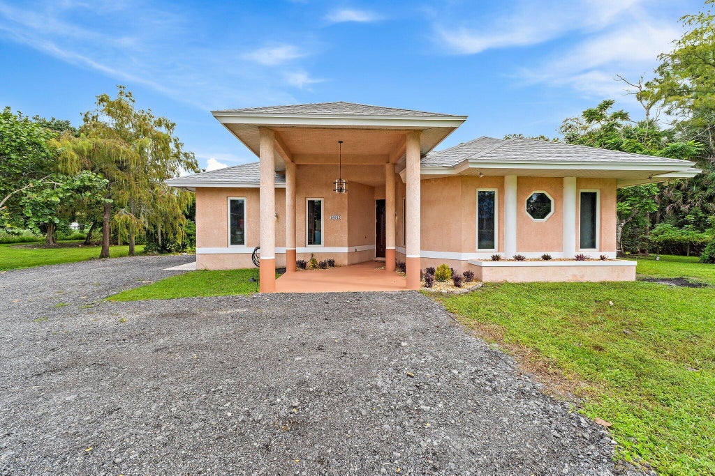 Photo of 16915 62nd Road N, Loxahatchee, FL 33470 (MLS # B26083323)