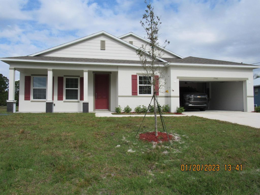 Photo of 5941 NW Batchelor Terrace, Port St Lucie, FL 34986 (MLS # R10891526)