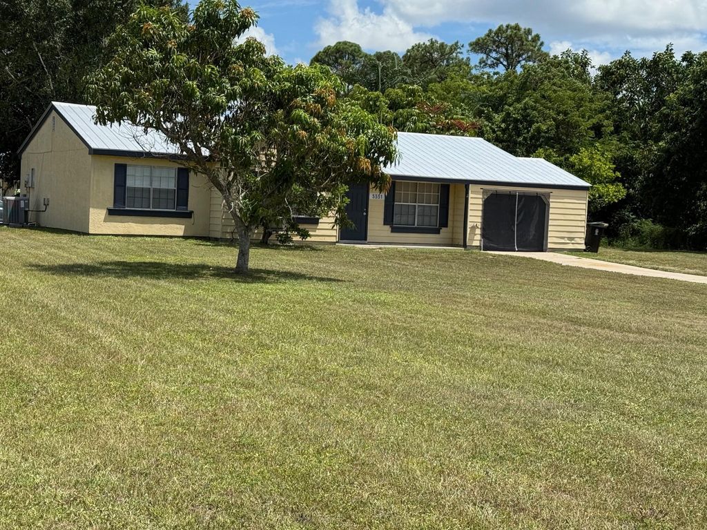 Photo of 3331 SW Ensley Court, Port Saint Lucie, FL 34953 (MLS # R11118454)