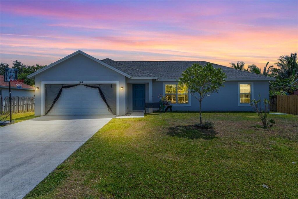 Photo of 1165 SW Empire Street, Port Saint Lucie, FL 34983 (MLS # R11083388)