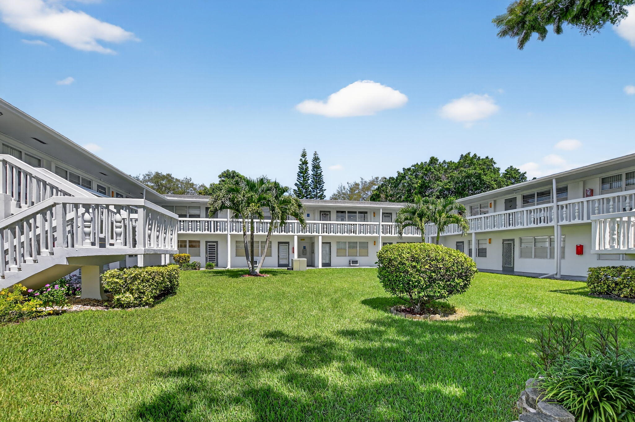 This one-of-a-kind second-floor unit blends coastal charm with a rustic twist--meticulously cared for and move-in ready. From the moment you enter, the layout flows effortlessly through the living and dining areas out to a screened balcony where sunrise views and golden light fill the space daily.. Located in a quiet, easily accessible corner of the community, assigned parking is conveniently located directly in front, with plenty of guest parking available nearby. The building features a brand-new roof, enhancing overall energy efficiency and helping keep the unit cool and comfortable year-round. Live where comfort meets resort-style living:This vibrant, gated community is undergoing multi-million dollar upgrades and offers endless amenities.