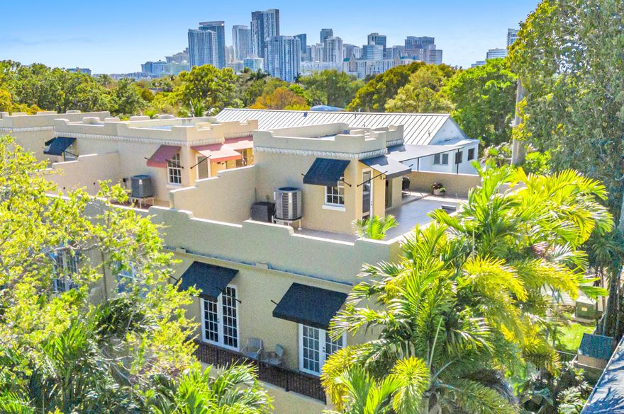 Rare Victoria Park townhome with an expansive rooftop terrace designed for entertaining. This beautifully updated, move-in ready residence features a bright open-concept layout with large windows and French doors that fill the home with natural light. The chef's kitchen offers custom cabinetry, quartz countertops, marble backsplash, Bosch appliances, and an expanded island overlooking the living and dining areas. Elegant finishes include porcelain tile flooring, crown molding, and renovated bathrooms with quality fixtures. The spacious primary suite provides a relaxing retreat, while the private rooftop terrace features an outdoor kitchen, dining area, and lounge space. Additional upgrades include new A/C (2024) and numerous interior and exterior improvements. Ideally located! Upgrades and Improvements: Extensive upgrades throughout the home including redesigned open-concept first floor, custom kitchen cabinetry (2022), quartz countertops (2020), marble backsplash, expanded island, Bosch refrigerator and hood, wine cooler bar, and under-cabinet lighting (2026). European porcelain tile flooring throughout first floor and upper levels with updated crown molding, baseboards, door hardware, and lighting.  Primary suite features a fully renovated bathroom with quartz countertops, custom vanity, Kohler fixtures, updated tub and bidet, and Restoration Hardware lighting. Guest bathroom also renovated with marble vanity, updated fixtures, tub, and shower glass.  Major mechanical improvements include new American Standard A/C system, air handler, heater, and thermostat installed in 2024 with warranty.  Exterior upgrades include rooftop deck waterproofing, travertine tile, copper flashing and scuppers (2021), rooftop fan (2023), rooftop bath updates (2023), roof update above third-floor kitchen (2025), balcony waterproofing and tile replacement (2023), new exterior paint (2026), PVC vinyl fencing (2025), aluminum gates, updated sprinkler system, exterior wiring upgrades, and pavers reset (2026).  Garage updates include new motor (2023) and spring (2024). Rooftop deck includes outdoor refrigerator and full bath with option for sauna installation.