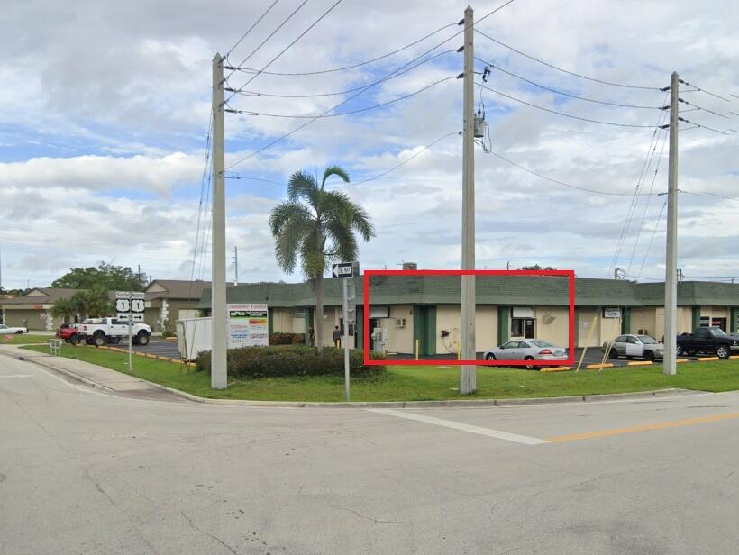 Commercial condo warehouse/office space/retail corner unit with excellent street frontage. Approximately 1,100 sq feet with two bathrooms. Two actual storefronts sold as one property. Could easily be converted back to two units and can also add roll up doors. Perfect for mechanic, shop, retail or office space with plenty of parking. Currently used as warehouse for personal storage. HOA $645 per quarter. City water and sewer. Very low taxes. Great location just one block from US1.