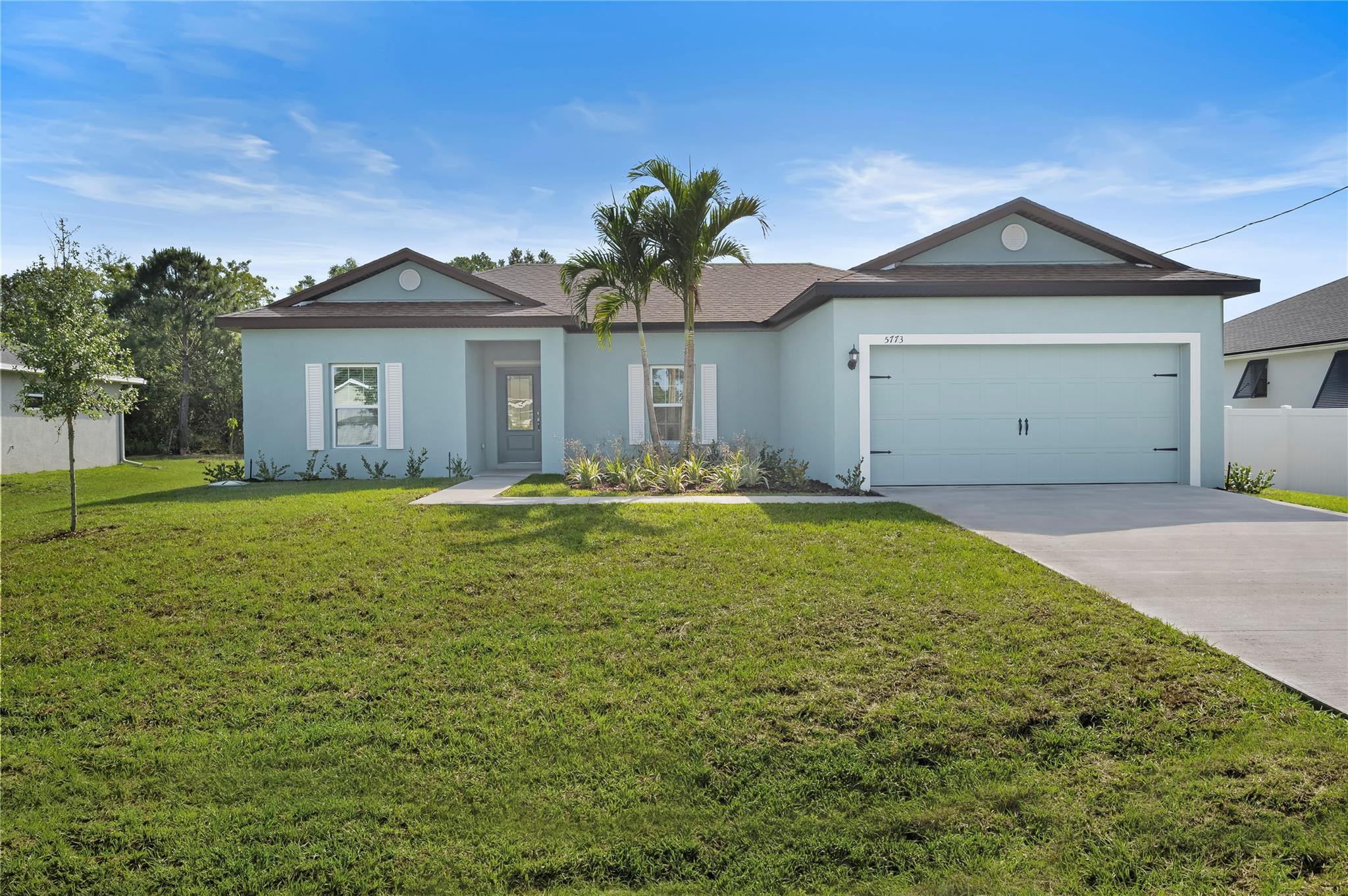 We are proud to present the Crane floor plan at Port St. Lucie! This beautiful, 3-bedroom, 2-bath home
comes with thousands of dollars’ worth of upgrades. These include all new energy-efficient Whirlpool®
appliances, spacious countertops, stunning wood cabinets and an attached two-car garage. The Crane
at Port St. Lucie also showcases a master suite complete with a sizable walk-in closet. Loaded with
incredible curb appeal, the Crane home is enhanced with a stunning covered entryway and front yard
landscaping. In addition, Port St. Lucie residents looking to live in a premier location are presented with
a plethora of local area attractions such as amenity-packed parks, pristine beaches and water
recreational activities. *Appliance models are subject to availability.