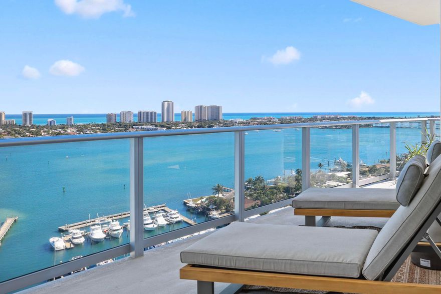 BRAND NEW - DIRECT WATERFRONT - ONE OF A KIND!! Located on the coveted SE CORNER, This residence is the epitome of South Florida Living. 10' Floor-to-ceiling windows frame stunning water views, bringing in natural light from every direction. Professionally decorated to the highest standards, complete with 3-beds, 3.5-baths, plus a den, hurricane-impact glass, Miele appliances, a wine cooler, European cabinetry, and a waterfall quartz island & private elevator lobby. The primary suite offers stunning water views, spacious walk-in closets, and a spa-style bath with dual sinks. The well-proportioned flow through floor plan is ideal for everyday living and entertaining. The spacious, wraparound terrace invites seamless indoor-outdoor living.  Indulge in waterfront dining at SeaHawk Prime by David Burke. Residents enjoy unparalleled amenities across a one-acre amenity deck, including a resort-style pool and spa, a rooftop lap pool and spa, fire pits, putting green, yoga deck, dog park, club room, cinema, golf simulator, guest suites, valet service, and 24-hour concierge. Indoor amenities include spin and yoga studios, sauna and steam rooms, bowling alley, theater, music studio, billiards and card rooms, kids' playroom, and teen gaming lounge. Pet-friendly. Lobby and amenities designed by Interiors by Steven G.