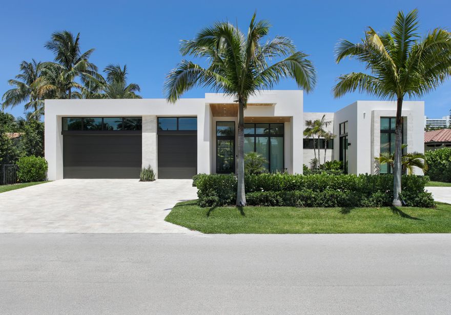 A stunning arrival is achieved at this architecturally impressive estate, where tropical plantings accent the motor court that leads to the dramatic portico entry, oversized pivot front door and three-bay garage. In the back yard, hedged for ultimate privacy, a covered loggia, with a summer kitchen and barbeque, overlooks the heated, salt-water pool, set within a verdant-green-carpeted lawn. RESIDENCE:  
Designed to deliver a true indoor/outdoor living experience, entire walls of 12-foot glass doors and windows unite the boundaries between inside and out in this magnificent, four-bedroom, Mid-Century-Modern-inspired estate, with 5,531± total square feet, built in 2021. The open floor plan, optimized for voluminous 12-foot ceilings and windows/doors provide light, bright interiors, featuring custom details that include engineered-oak floors and finely crafted walnut built-in cabinetry. The welcoming foyer flows into the chic living room, with a double-sided gas ribbon fireplace clad in limestone, a wet bar, and floor-to-ceiling sliding glass doors that open to the loggia and pool area. The double-sided fireplace also functions as the focal point in the adjoining office/den. Offering a nice flow for entertaining, the family room -- with built-in cabinetry for media and sliding glass doors that lead to the loggia and side garden -- is open to the kitchen and comprises dining and seating areas. The gourmet kitchen is fitted with a huge waterfall island offering pull-up seating, streamlined walnut contemporary cabinetry that integrates professional-grade Miele appliances, and porcelain slab countertops, backsplash and hood surround. The primary suite, featuring sliding glass doors to the loggia and lawn, comprises a huge, custom-fitted, walk-in closet and spa-inspired bathroom, appointed with custom walnut floating vanities, porcelain countertops, a freestanding soaking tub viewing a private garden, a walk-in shower with multi heads, and a water closet.  Designed with a split-bedroom plan affording privacy, the three guest bedrooms are situated on the opposite side of the residence, with one of the bedrooms serving as a pool-view VIP suite. Completing the floor plan are a cabana bath, powder room and laundry room. As visually stunning as it is easily livable, this one-of-a-kind residence is a rare find in the Estate Section, a coveted neighborhood.

"Builder will construct a new primary suite with approximately 1,000 sq. ft. as depicted in floorplan (Option B) for a list price of $6.495 Million"

DISCLAIMER: Information published or otherwise provided by the listing company and its representatives including but not limited to prices, measurements, square footages, lot sizes, calculations, statistics, and videos are deemed reliable but are not guaranteed and are subject to errors, omissions or changes without notice. All such information should be independently verified by any prospective purchaser or seller. Parties should perform their own due diligence to verify such information prior to a sale or listing. Listing company expressly disclaims any warranty or representation regarding such information. Prices published are either list price, sold price, and/or last asking price. The listing company participates in the Multiple Listing Service and IDX. The properties published as listed and sold are not necessarily exclusive to listing company and may be listed or have sold with other members of the Multiple Listing Service. Transactions where listing company represented both buyers and sellers are calculated as two sales. The listing company's marketplace is all of the following: Vero Beach, Town of Orchid, Indian River Shores, Town of Palm Beach, West Palm Beach, Manalapan Beach, Point Manalapan, Hypoluxo Island, Ocean Ridge, Gulf Stream, Delray Beach, Highland Beach, Boca Raton, East Deerfield Beach, Hillsboro Beach, Hillsboro Shores, East Pompano Beach, Lighthouse Point, Sea Ranch Lakes and Fort Lauderdale. Cooperating brokers are advised that in the event of a Buyer default, no financial fee will be paid to a cooperating Broker on the Deposits retained by the Seller. No financial fee will be paid to any cooperating broker until title passes or upon actual commencement of a lease. Some affiliations may not be applicable to certain geographic areas. If your property is currently listed with another broker, please disregard any solicitation for services. Copyright 2022 by the listing company. All Rights Reserved.