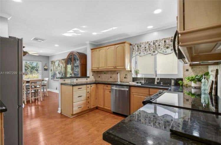 Photo of 10681 GREENBRIAR Court, Boca Raton, FL 33498 (MLS # B26061820)