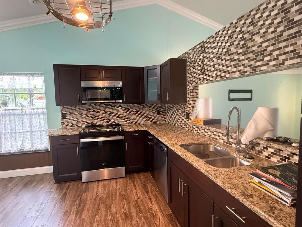 Photo of 9707 Sun Pointe Drive, Boynton Beach, FL 33437 (MLS # R11138548)