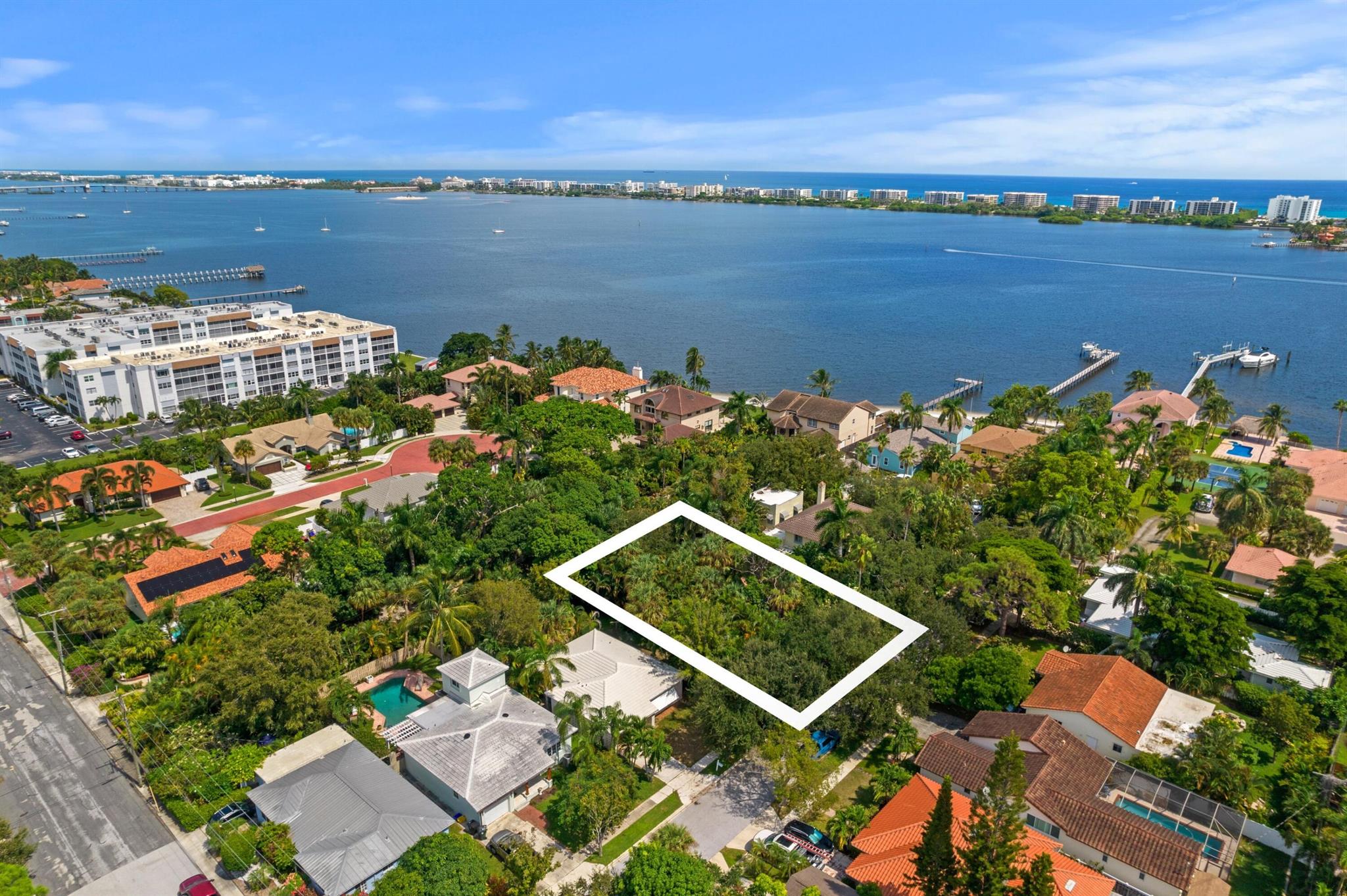 Rare, empty, buildable lot, east of Lakeside Drive in Lake Worth Beach. Build your dream home, or the lot is also for sale with the adjacent home located at (90 17th Ave. South Lake Worth Beach). There are assorted palm trees, and landscaping that can be moved, or incorporated in to the new design. Combined with the home next door, a guest house and pool could be added, creating your own compound. 17th Avenue is a quiet street east of Lakeside Dr. lined with Florida oak trees, with intracoastal homes at th end of the street. Each lot is 5850 Sq. Ft.