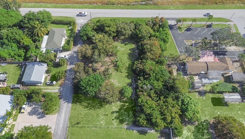 Photo of 8686 SE Lyons Street, Hobe Sound, FL 33455 (MLS # R11144117)