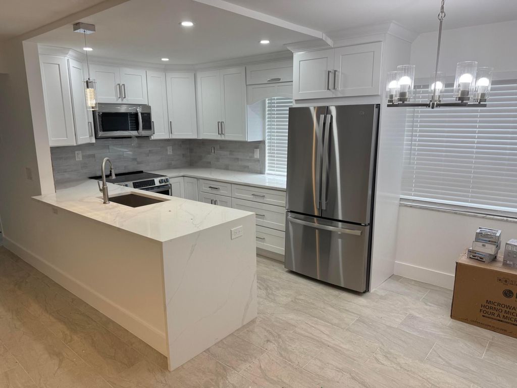 Photo of 790 Burgundy Q, Delray Beach, FL 33484 (MLS # B26029717)