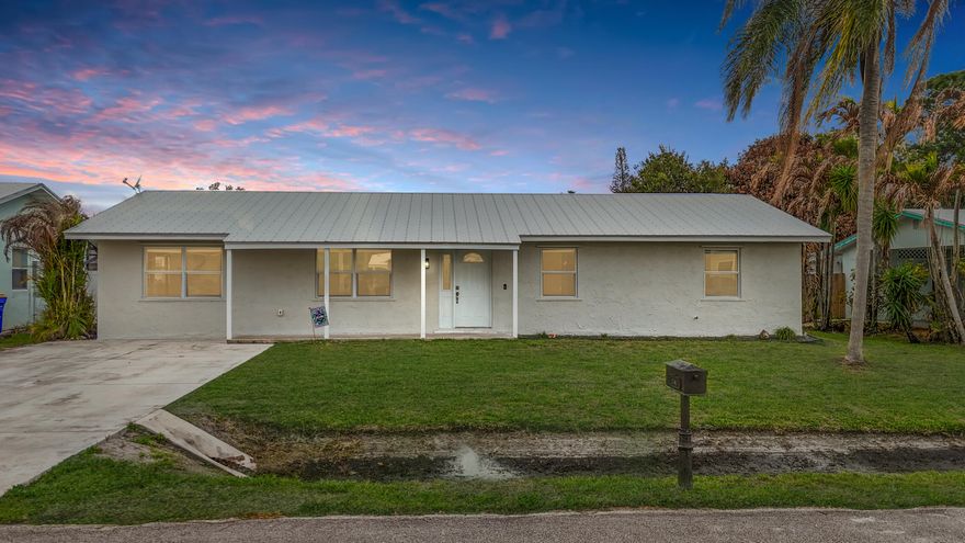 THIS IS IT. The kind of home buyers wait for... and rarely find. 4BR/2BA CBS home in Stuart with NO HOA and a fully FENCED YARD that gives you space to actually live. Inside, a RENOVATED KITCHEN and BATHS set the tone with clean, updated finishes, while FRESH INTERIOR PAINT keeps everything light and move-in ready. The big-ticket items are already done with a NEWER METAL ROOF and UPDATED A/C systems, so you can focus on living, not fixing. Functional layout, solid construction, and no added fees or restrictions. Located in an A-RATED SCHOOL ZONE, this is where value, location, and livability finally meet. Step inside and see why this one stands out. All of this is in Stuart, Florida, proudly named "America's Happiest Seaside Town" by Coastal Living Magazine. Here, charming streets lead to a vibrant downtown filled with unique shops, waterfront dining, art galleries, and year-round festivals. The river and ocean are your playgrounds with endless opportunities for boating, fishing, and watersports. Friendly neighbors, scenic beauty, and a thriving culture make Stuart more than a destination, it's home.
