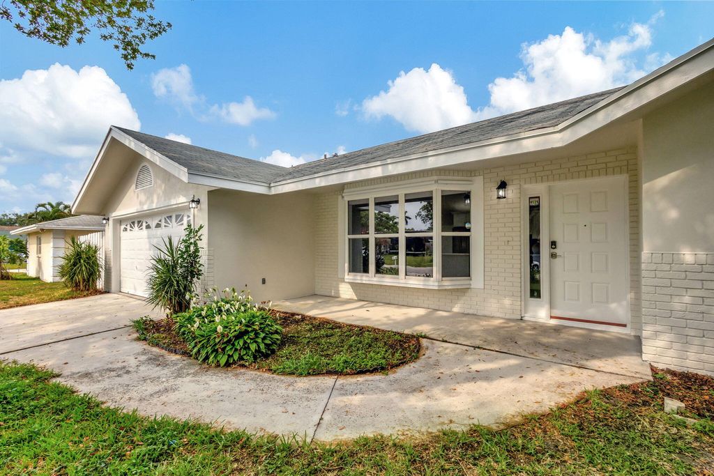 Photo of 843 Azalea Drive, Royal Palm Beach, FL 33411 (MLS # R11160639)