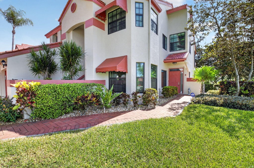 Photo of 7677 Lexington Club Boulevard #B, Delray Beach, FL 33446 (MLS # B26047917)