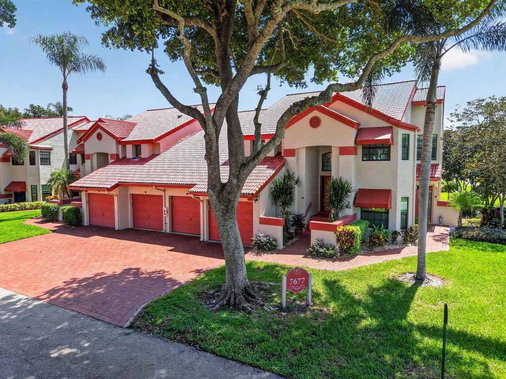 Photo of 7677 Lexington Club Boulevard #B, Delray Beach, FL 33446 (MLS # B26047917)