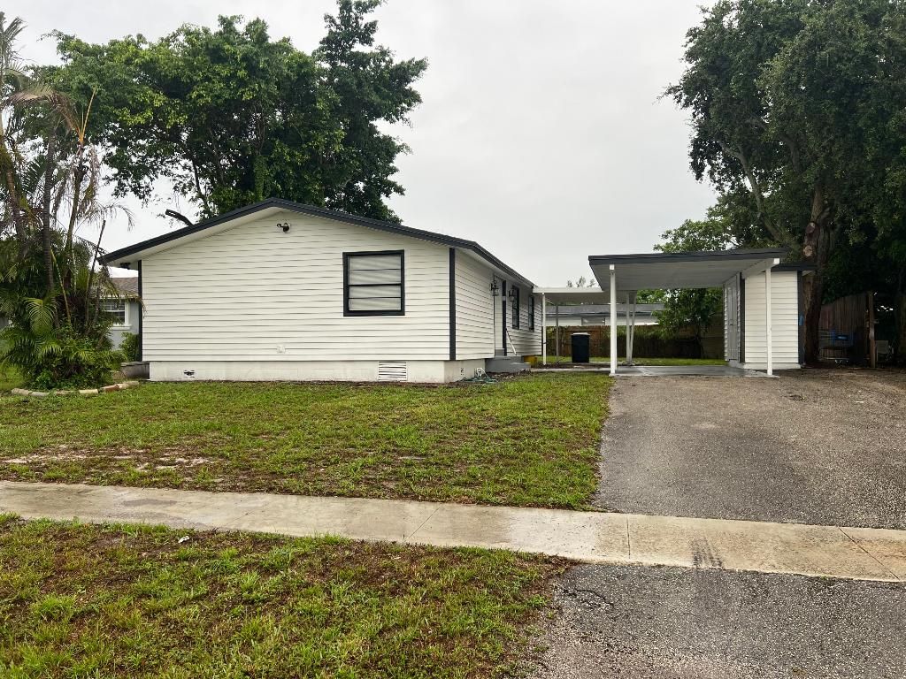 Photo of 3884 Mackinac Road, Lake Worth, FL 33462 (MLS # R10996565)