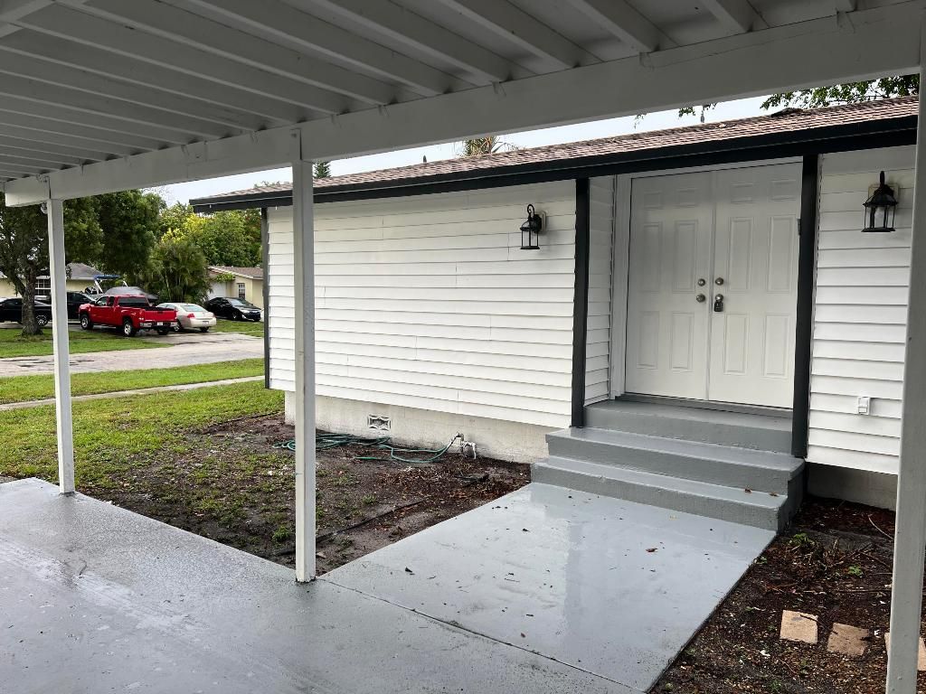 Photo of 3884 Mackinac Road, Lake Worth, FL 33462 (MLS # R10996565)