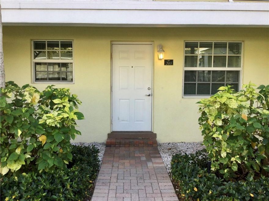 What's not to love about the Grove in Wilton Manors. Lovely gated community just steps to Wilton Drive. Nice community with pool, clubhouse, clean common laundry area, beautifully landscaped and pet friendly. With this unit you get a super well maintained first floor unit with great sitting area out front and lots of natural light. Neutral tile flooring throughout, a nicely appointed kitchen with bar seating, ss appliances and plenty of space. Beautifully updated and modern master bath with gorgeous shower, fixtures and finished. Generous sized bedrooms and one with separate entry/exit. Well priced and move in ready. No pets as per owner.