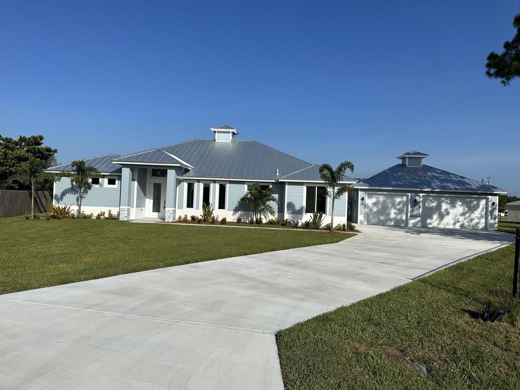 Photo of 5862 NW Elam Court, Port St Lucie, FL 34986 (MLS # R10903557)