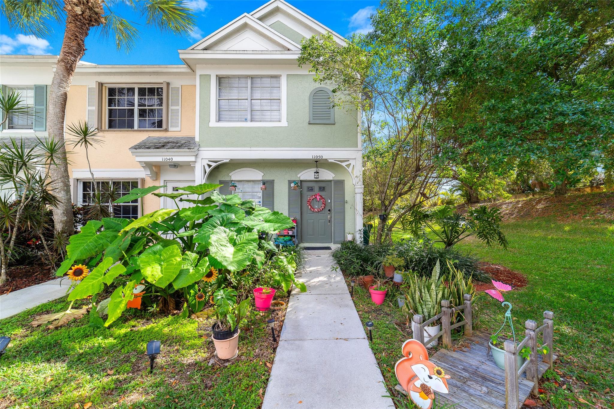 Seller will contribute $10,000 for closing costs. AMAZING DEAL Welcome home to this charming corner townhouse with Key West-style architecture. Perfect for the first time home buyer or a savvy investor, this property exudes value from the day you take the keys! The upstairs boasts two spacious en-suite full bathrooms. The property features a private backyard and side yard, offering plenty of space and seclusion. Freshly painted exterior and all external features covered by the HOA, gives you peace of mind and makes home ownership affordable. Current owners are offering a maintenance bonus for a new interior coat at closing. Too many great features to list! Reach out with your questions, schedule your tour, and don’t miss your chance on this great home that just needs a little TLC!