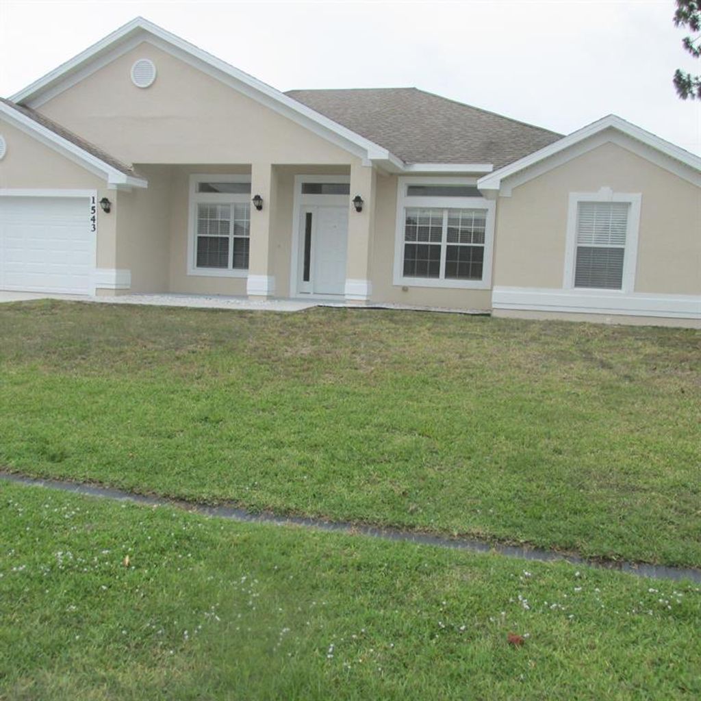 Photo of 1543 SE Saxony Street, Port Saint Lucie, FL 34983 (MLS # R10716114)