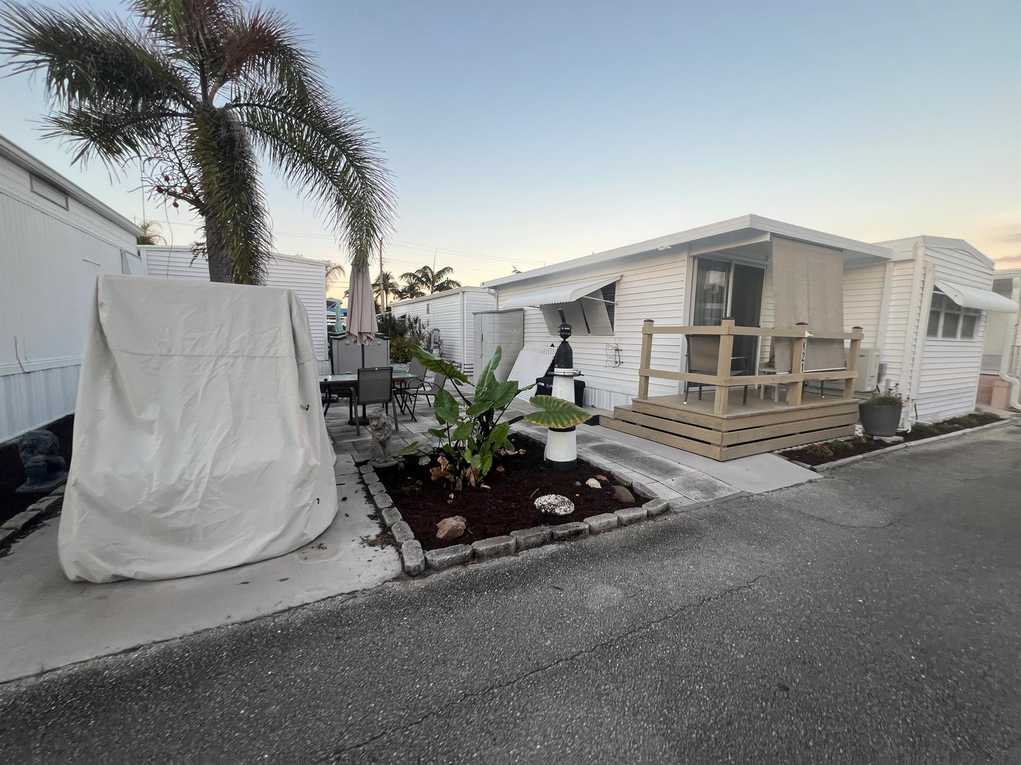 This double lot in Briny Breezes Florida is 21 units to your private beach and boasts 46 shares of stock in Briny Breezes inc. It features a large side yard for entertaining and or parking. The unit is light and bright with a great floor plan. Very unique opportunity to own two lots and enjoy tons of space, a one of a kind lifestyle and the ocean breezes of this amazing location.