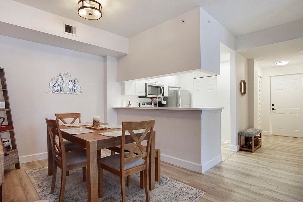 Photo of 2804 Sarento Place #204, Palm Beach Gardens, FL 33410 (MLS # R10977614)