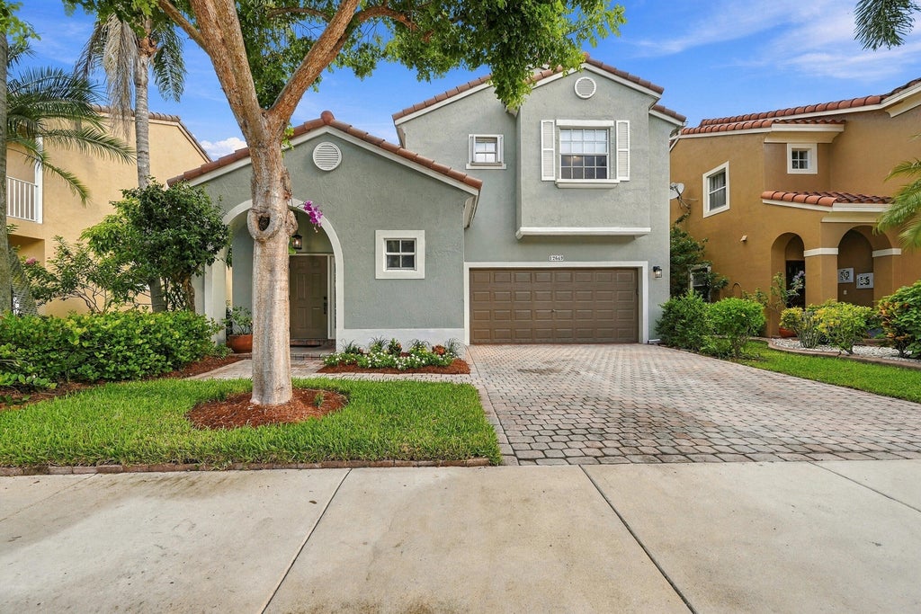 Photo of 12649 NW 10th Street, Coral Springs, FL 33071 (MLS # B26075221)