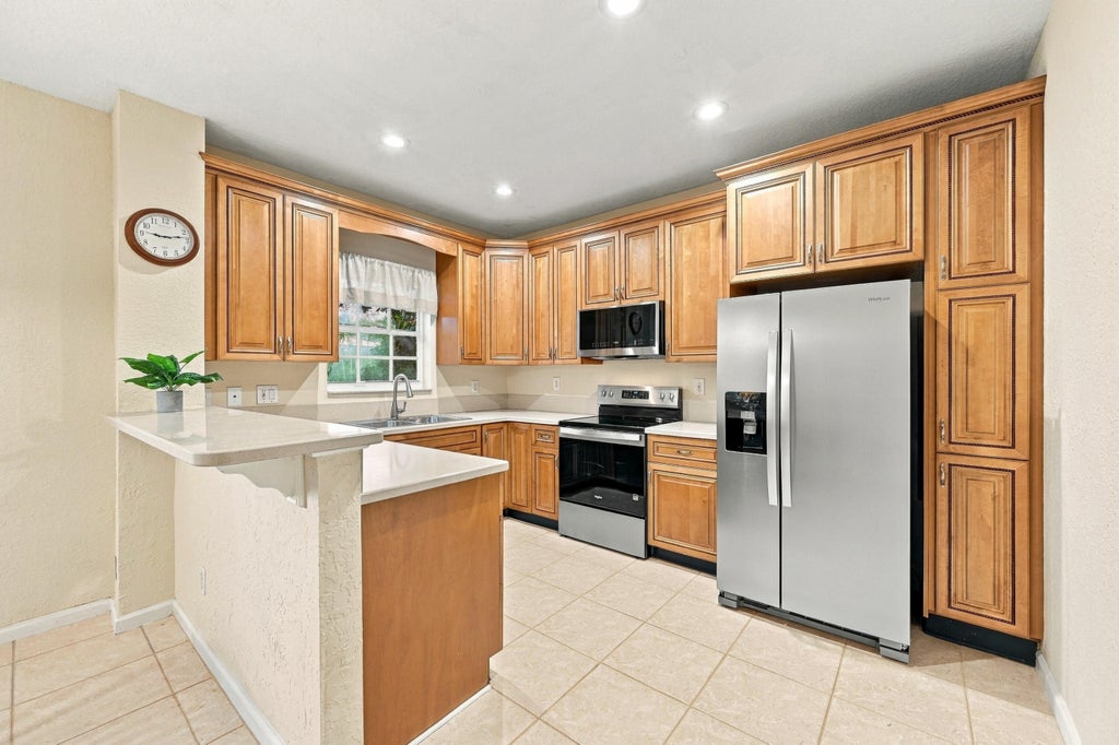 Photo of 12649 NW 10th Street, Coral Springs, FL 33071 (MLS # B26075221)
