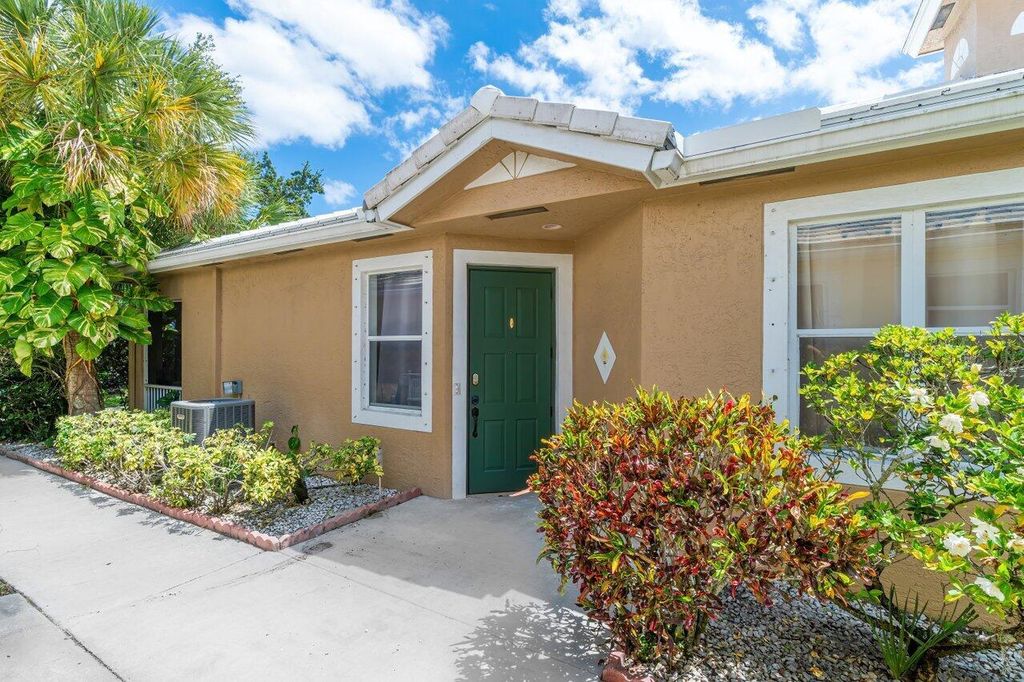 Photo of 6947 Blue Skies Drive, Lake Worth, FL 33463 (MLS # R10982757)