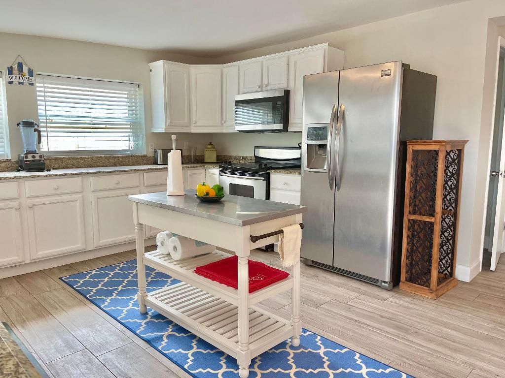 Photo of 129 SW Hideaway Place, Stuart, FL 34994 (MLS # R10937013)