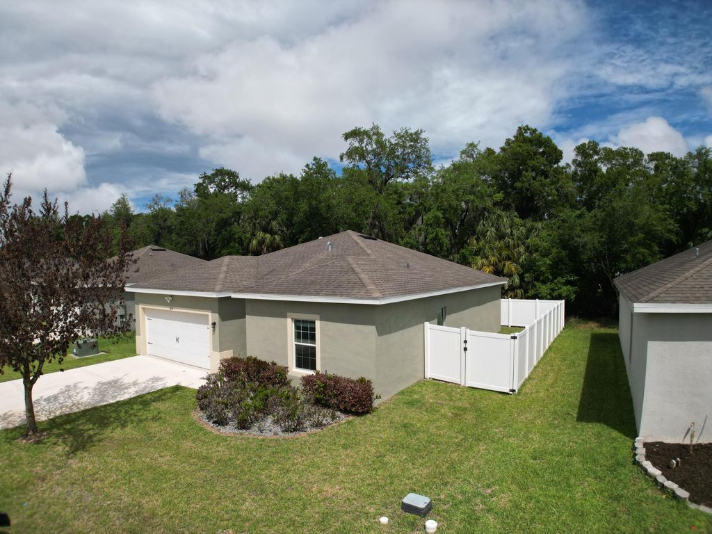 Photo of 5234 Oakland Lake Circle, Fort Pierce, FL 34951 (MLS # B26012457)