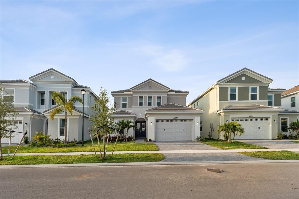 Move into this Beautiful 4 bedrooms 3.5 bathrooms, and 2 car garage Home. Spectacular Model home with volume ceilings and gourmet Kitchen, with Quartz Countertops, complete with breakfast bar and a Center Island. Impact windows throughout, a huge backyard, and a lovely covered brick paver Patio area. This secure community has an amazing Clubhouse with an outdoor patio and vacation-style amenities such as a resort-style pool, Kids play zone, Bocce Ball, Picnic Areas, and a top-of-the-line Fitness Center.