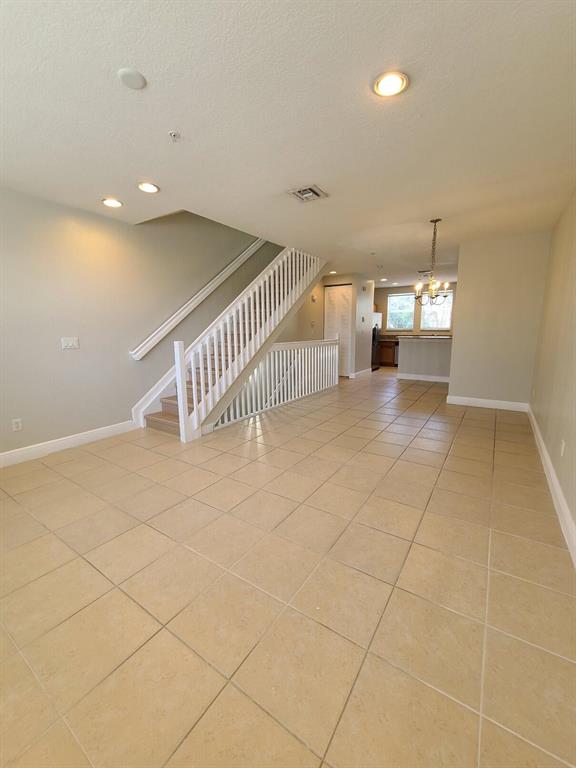 IN THE HEARTH OF WEST PALM BEACH, IN MAN GATED DESIRABLE CITYSIDE CONDO COMMUNIITY 3 BEDROOM 2 .1 BATHROOM TRIPLEX CONDO !!! TILE FLOORING IN LIVING ROOM AND BRAND NEW LAMINATE FLOORING ON ROOMS AND STAIRS !!! ONE CAR GARAGE !!! HUGE OPEN KITCHEN ! GRANIT COUNTERTOPS! STAINLESS STEEL APPLIANCES!! FRONT LOAD NEWER WASHER AND DRYER!!!FULL IMPACT WINDOWS !!!MINUTES AWAY TO PALM BEACH OUTLET AND TO I-95!!
