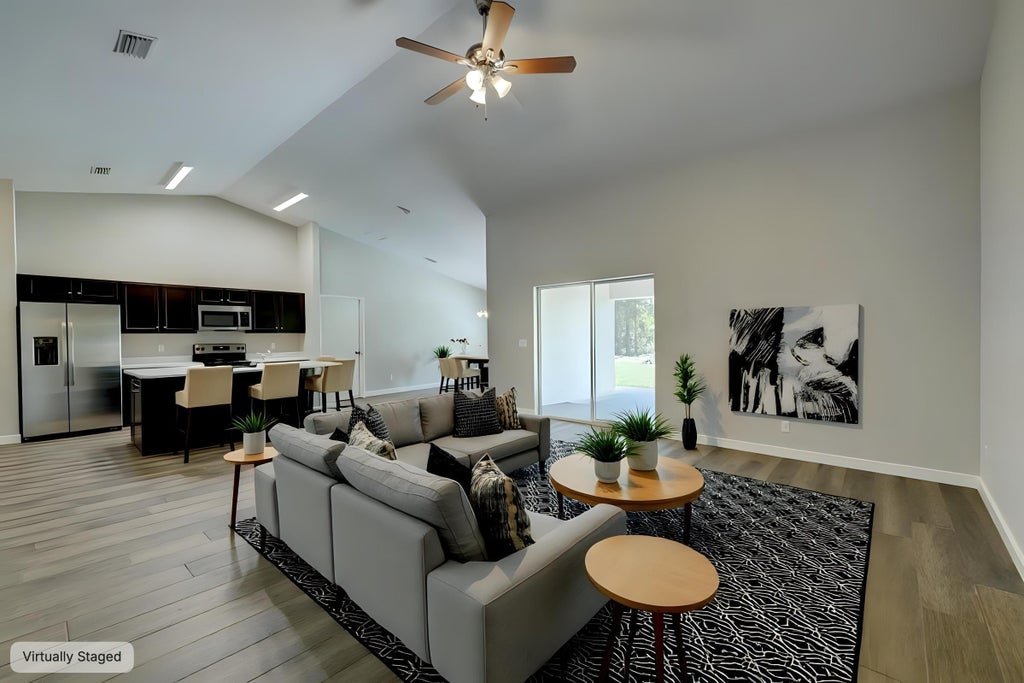 Photo of 929 SW Cornelia Avenue, Port Saint Lucie, FL 34953 (MLS # B26075285)
