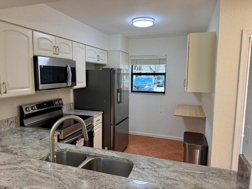 Photo of 3149 MILLWOOD Terrace #1210, Boca Raton, FL 33431 (MLS # B26064542)