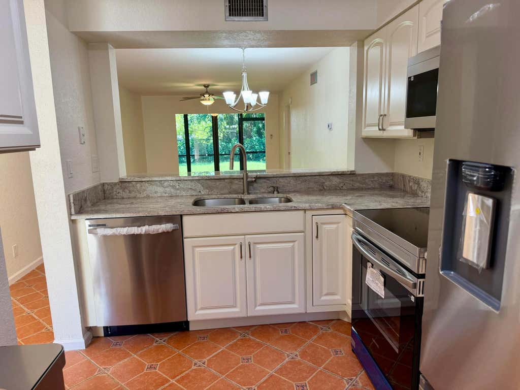 Photo of 3149 MILLWOOD Terrace #1210, Boca Raton, FL 33431 (MLS # B26064542)