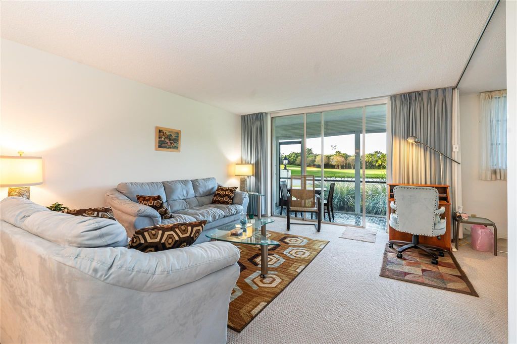 Photo of 9611 N Hollybrook Lake Drive #107, Pembroke Pines, FL 33025 (MLS # F10473234)