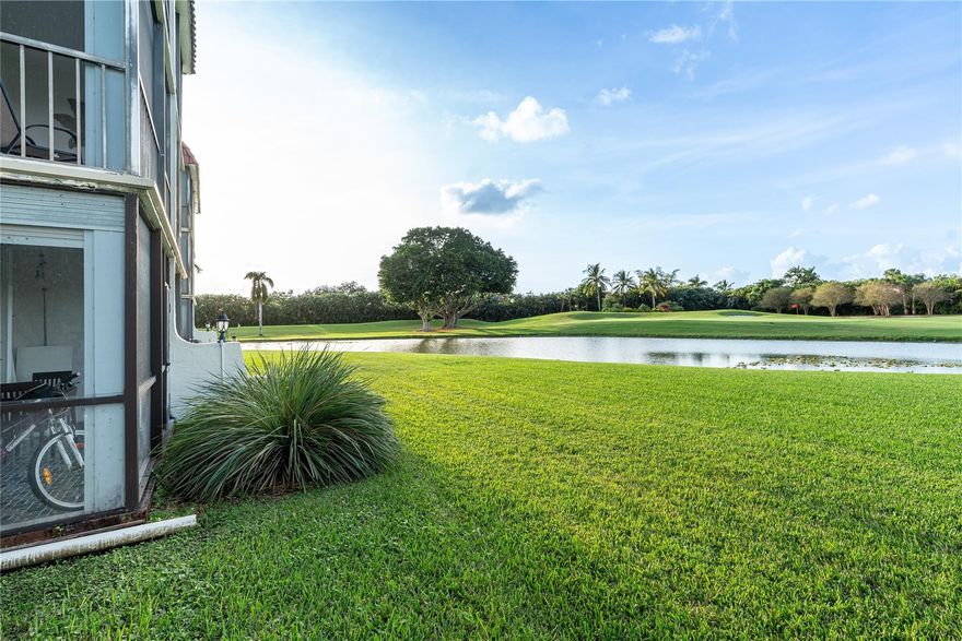 LOCATION! LOCATION! LOCATION! Enjoy your morning coffee and/or evening cheer overlooking EXPANSIVE LAKE/PGA 10TH FAIRWAY-GREEN VIEWS! Convenient 1st Floor! North/South Exposure. 2BR/2BA (1,170SF). Fully Furnished. 2 large walk-in closets. Clean and comfortable. Recreation Lease PAID IN FULL! FREE golf (except cart fees) on two 18 hole courses (PGA & Par3); Amenities include Restaurant, Billiard Room, Bbq/Picnic Area, Clubhouse, Courtesy Bus, Exercise Room, Heated Pool, Library, Putting Green, Sauna, Shuffleboard, Tennis, Pickle Ball, Vehicle Wash Area, Electric Car Charging Station. Close to shopping, dining & highways. 15 min. to beach. Association says 55+ age required; PRICED TO SELL FAST!